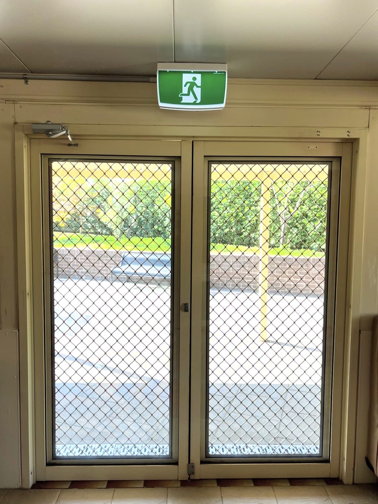 Emergency exit sign above a doorway